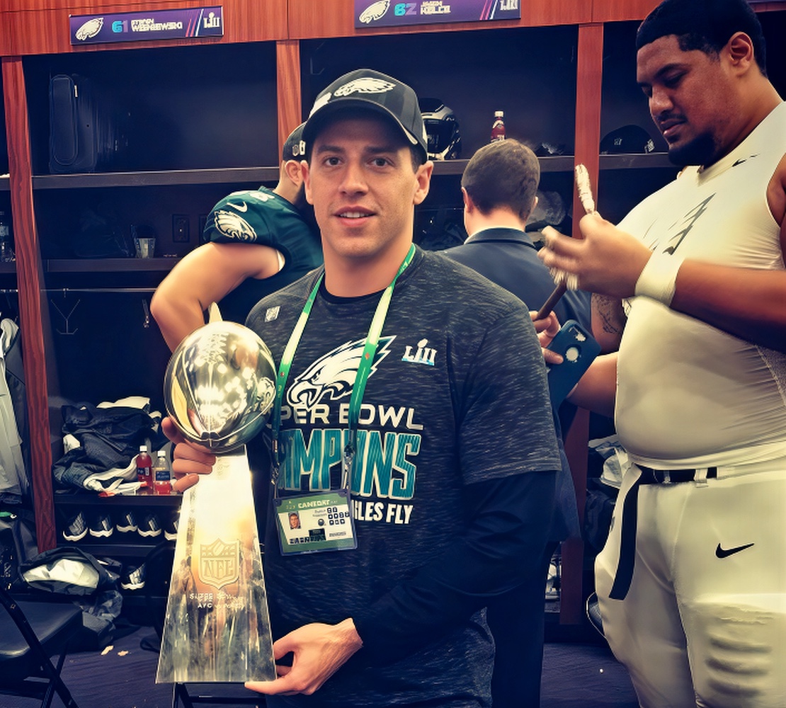 Ryan Paganetti with the Super Bowl LII trophy